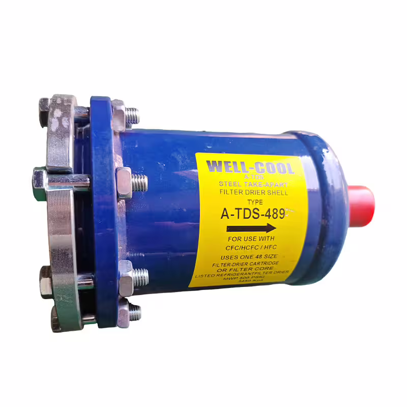 replaceable filter drier core and serviceable shell components