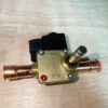 Flow direction arrows on refrigeration solenoid valve body